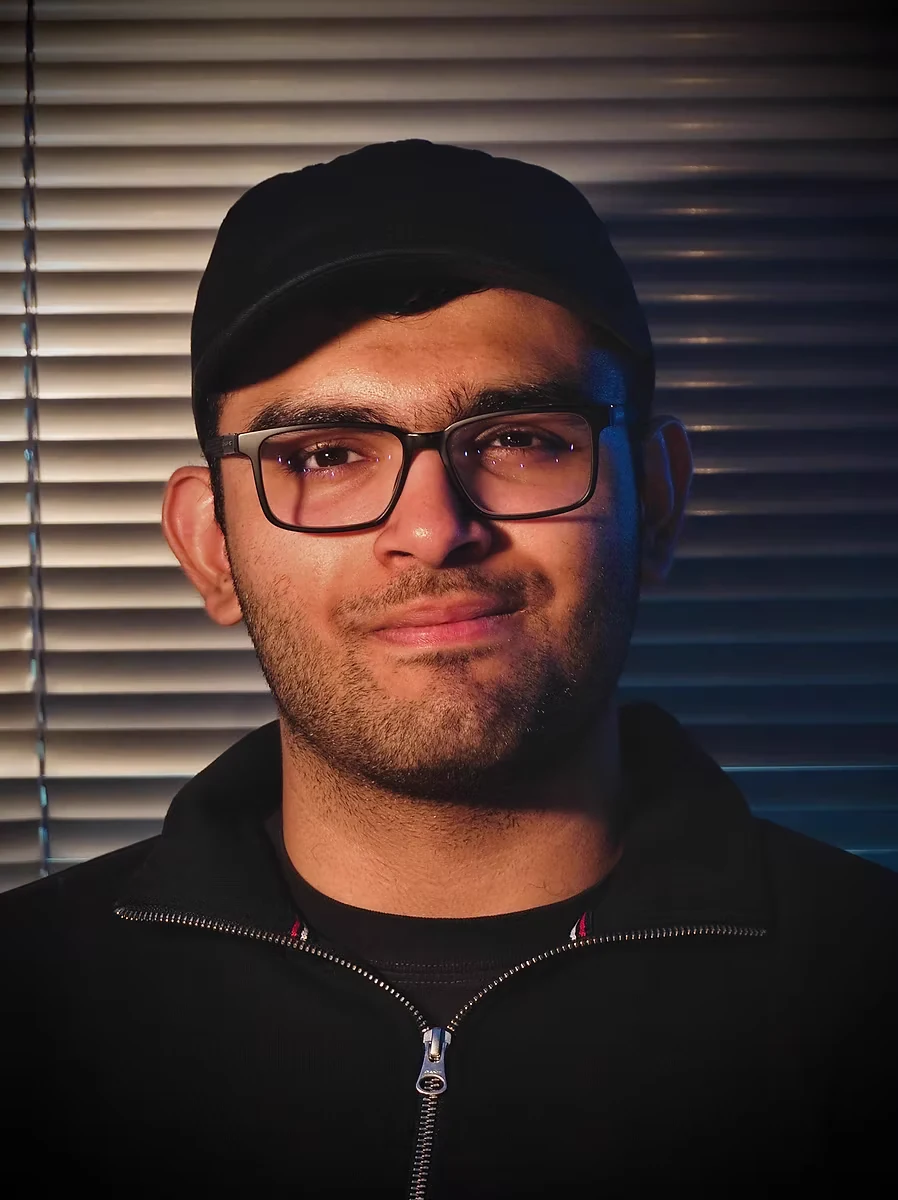 Portrait of Karan Paitka against window blinds