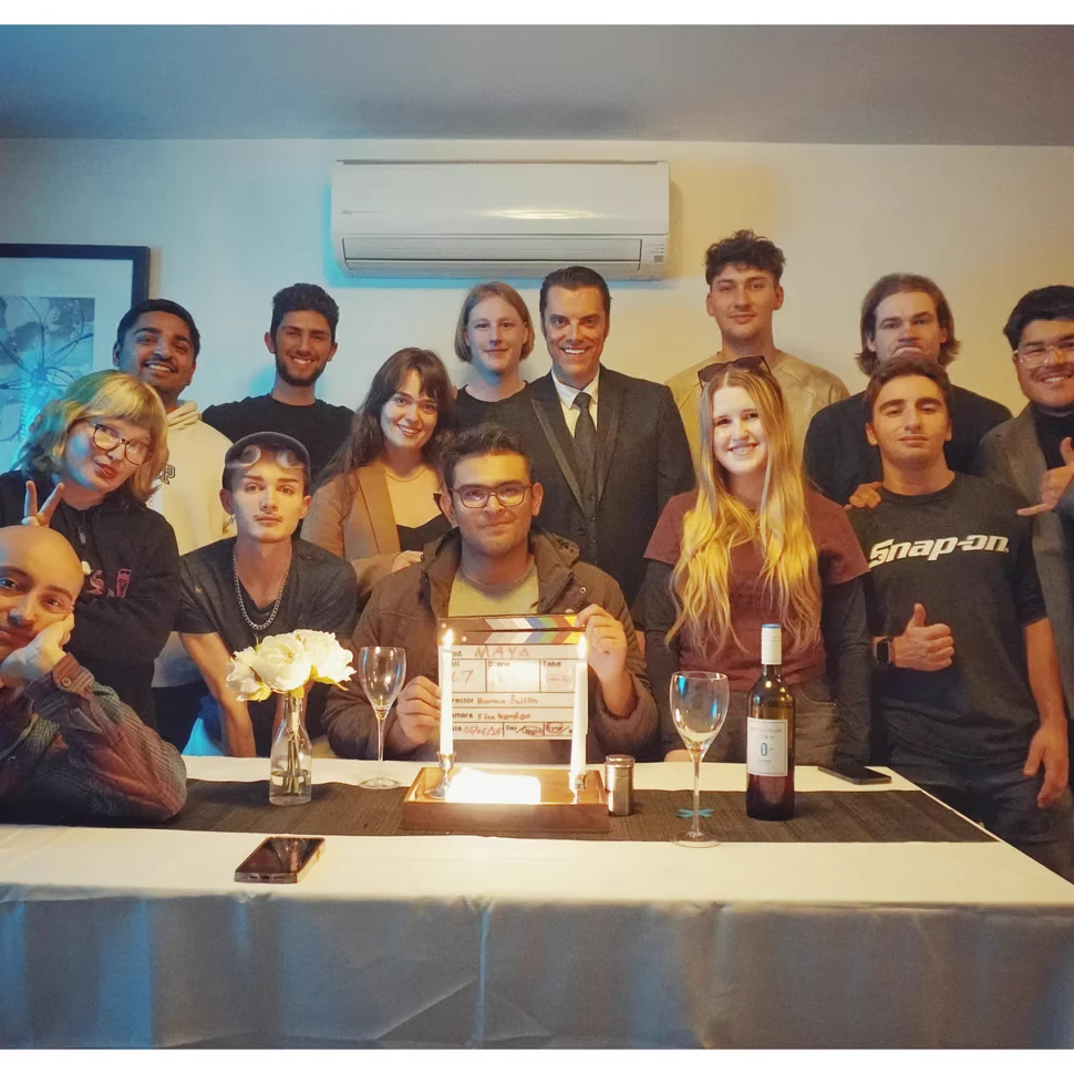 Cast and crew photograph from MAYA